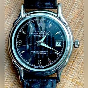 Rolex (Replica) mechanical watch no battery needed. Watch ticks like in video.